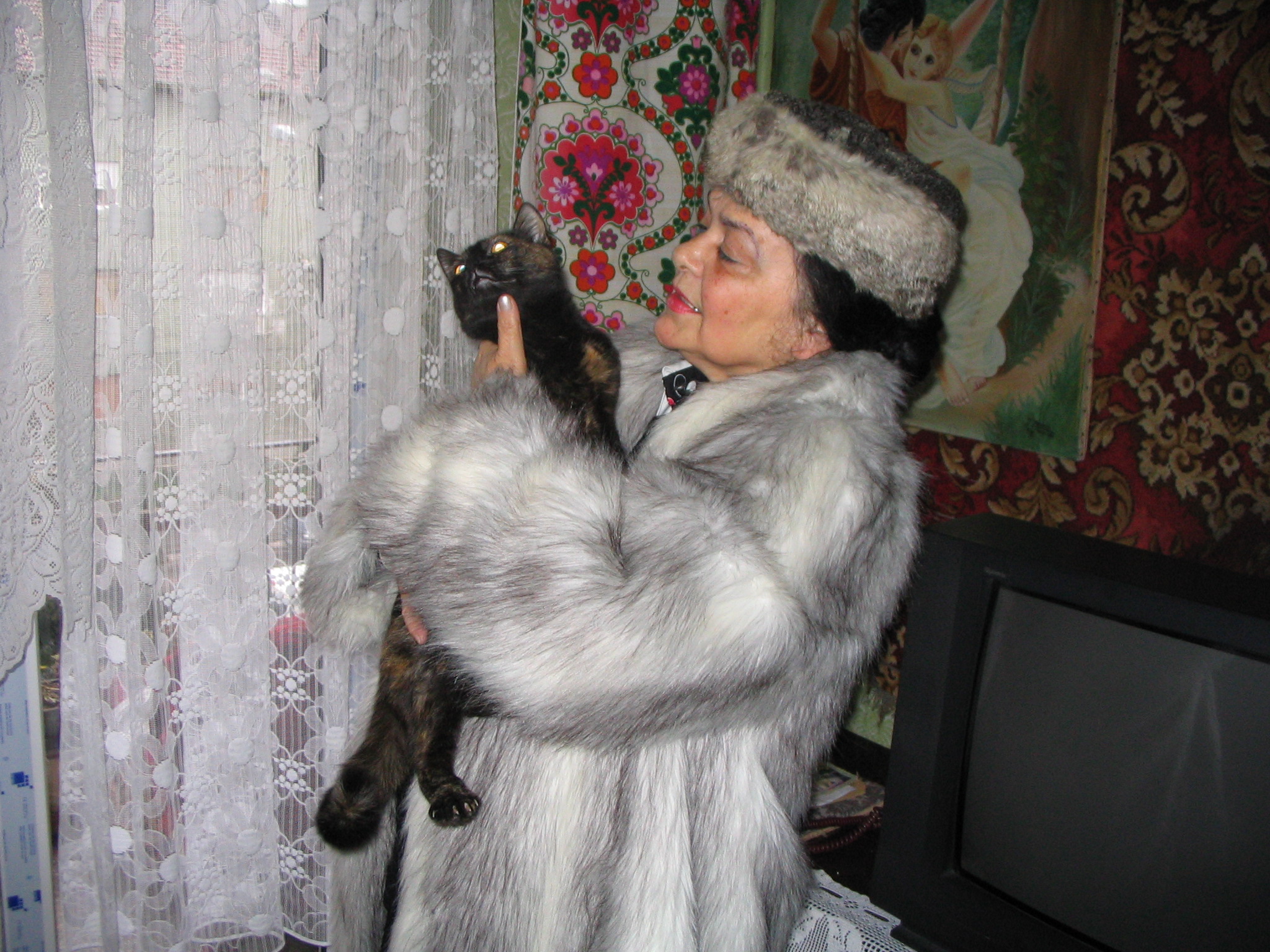 Lola și pisica Tomi